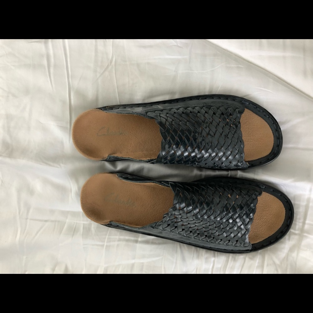 Almost new Clarks black slide on sandals